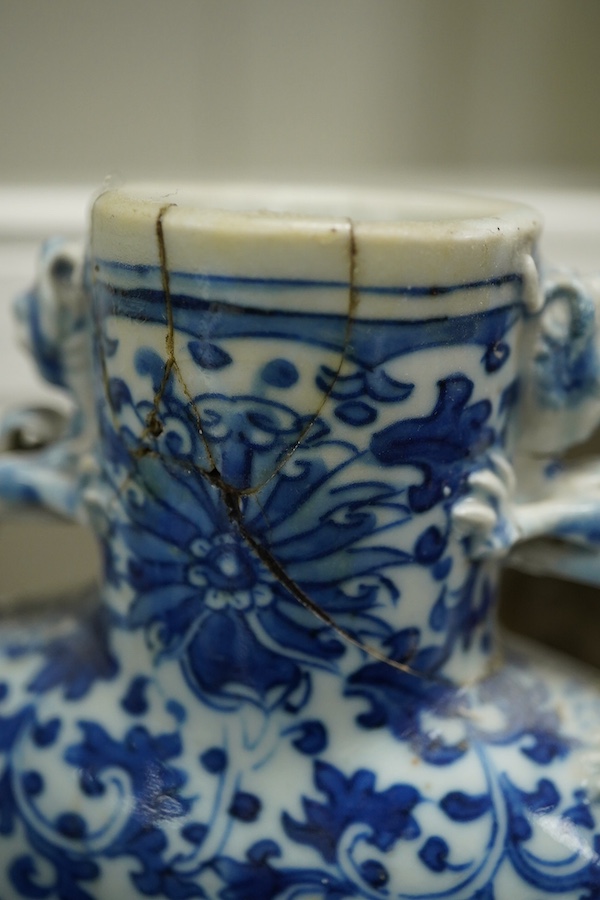 A pair of late 19th century Chinese blue and white moon vases, 23cm. Condition - one vase poor